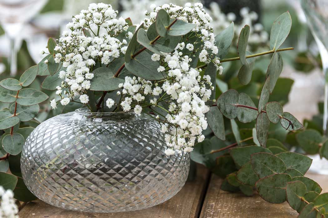 Oval diamond-cut glass vase